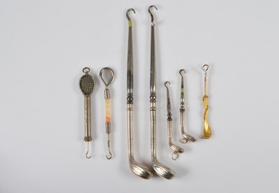 Lot 269 - A collection of novelty sporting button or glove hooks