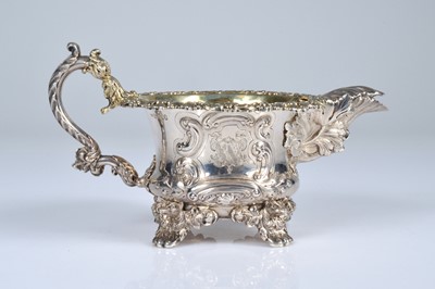 Lot 281 - A George IV style milk jug
