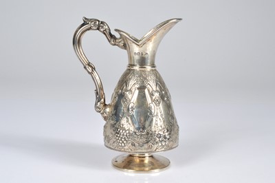 Lot 288 - A late Victorian silver jug by Walker & Hall