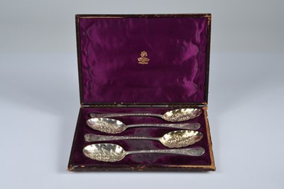 Lot 309 - A set of four George III silver berry spoons by George Smith III & IV