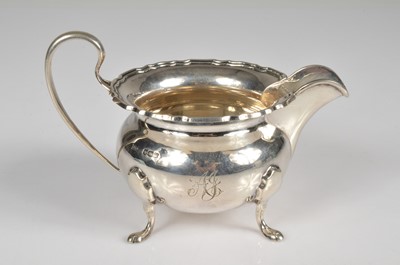 Lot 311 - A George VI silver milk jug by Walker & Hall