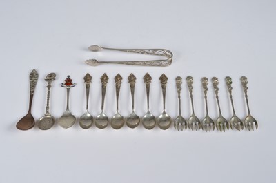 Lot 316 - A group of spoons & pair of tongs