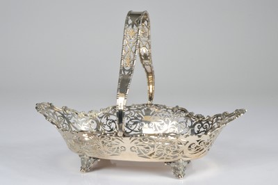 Lot 320 - An Edwardian silver swing handle dish from Asprey & Co