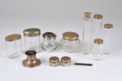 Lot 367 - Nine glass and silver mounted dressing table items