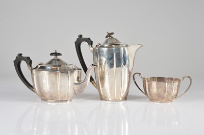 Lot 378 - A late George V silver three piece tea set by BBS Ld