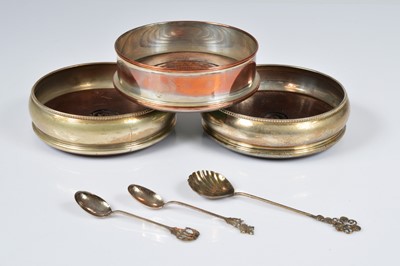 Lot 381 - A pair of silver plated wine bottle coasters