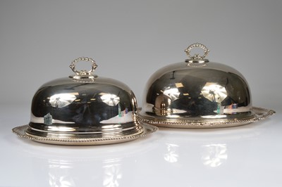 Lot 393 - Two late Victorian silver plated meat dishes & covers