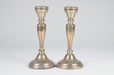 Lot 398 - A pair of 1960s silver filled candlesticks by Adie Bros