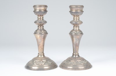Lot 401 - A pair of 1970s silver filled candlesticks