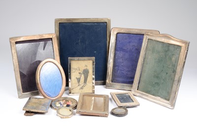Lot 402 - Twelve Art Deco period and later silver mounted photograph frames
