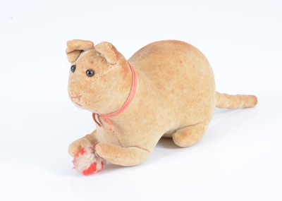 Lot 5 - An early lying velvet cat with pom-pom ball, circa 1908