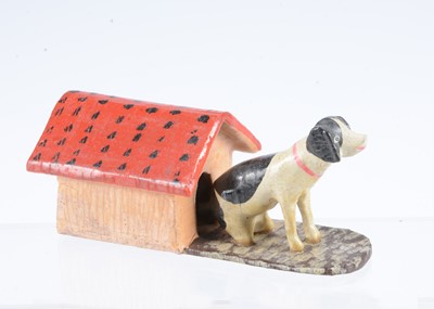 Lot 33 - A late 19th century Erzgebirge dog and kennel