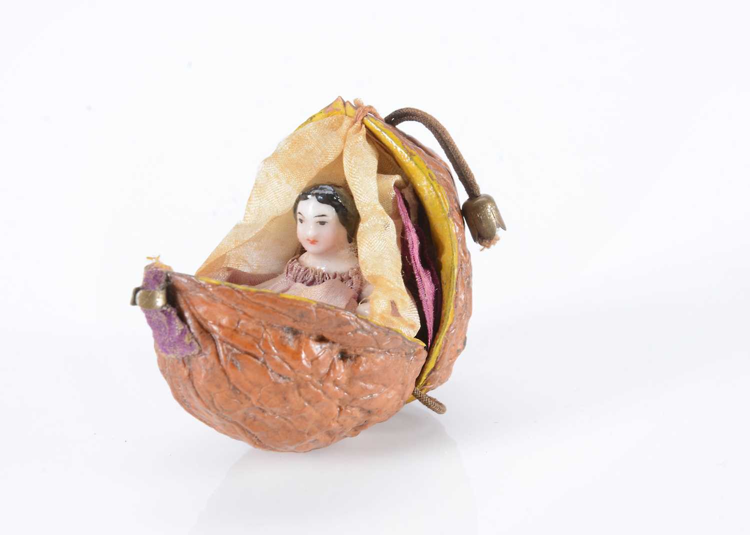 Lot 45 - An 19th century Frozen Charlotte in a walnut shell