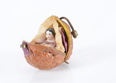 Lot 45 - An 19th century Frozen Charlotte in a walnut shell
