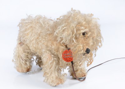 Lot 58 - A rare Bing Tripple-Trappel walking poodle, 1908 -1912