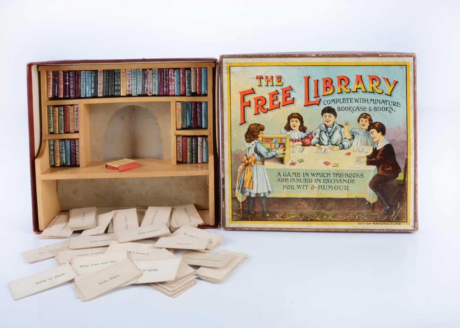 Lot 94 - A rare early 20th century British game ‘The Free Library - complete with Miniature Bookcase & Books’