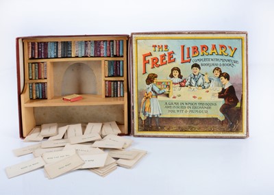 Lot 94 - A rare early 20th century British game ‘The Free Library - complete with Miniature Bookcase & Books’