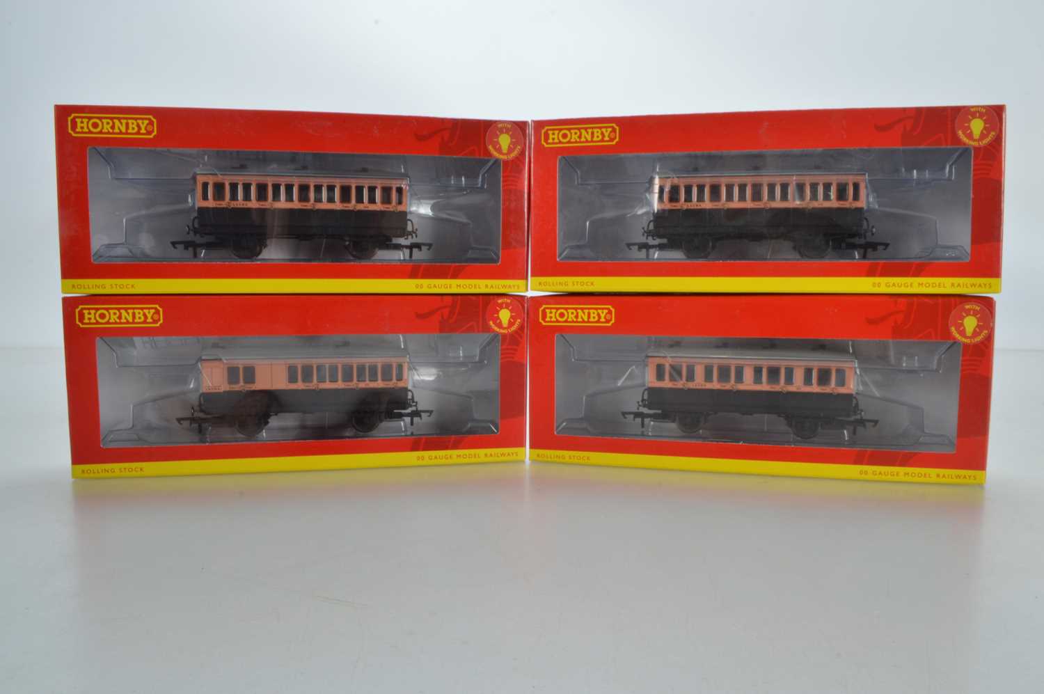 Lot 91 - Hornby (China) boxed 00 Gauge LSWR Salmon and Brown 4-wheel Coaches with Lights (4)