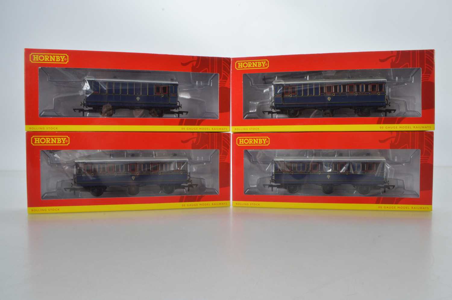 Lot 92 - Hornby (China) boxed 00 Gauge S&DJR Somerset and Dorset Joint Railway lined blue 6 wheel Coaches and 4-wheel Brake Luggage Van (4)