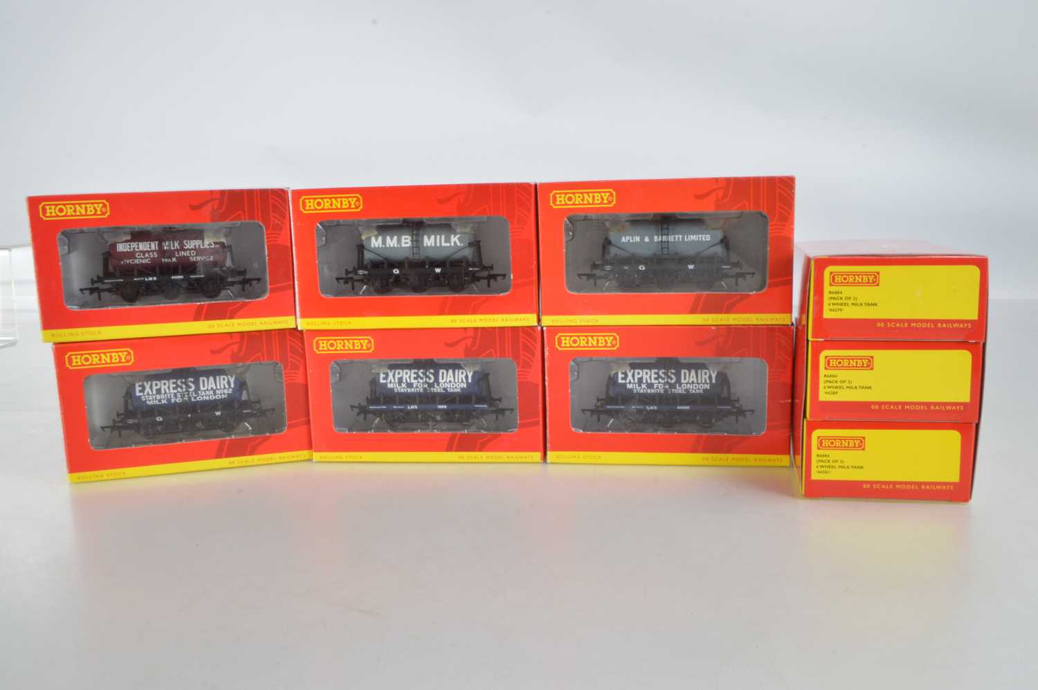 Lot 94 - Hornby (China) boxed 00 Gauge 6-wheel Milk Tank wagons including Express Dairy Triple Pack (9 wagons)