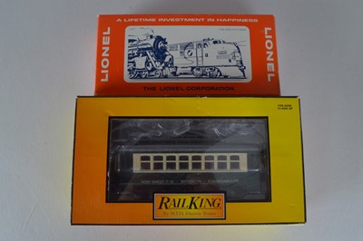 Lot 720 - MTH O gauge Trolley Car 1510 and Lionel 6-52153 Automobiles (2)