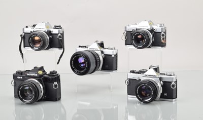 Lot 446 - Five Olympus OM SLR Cameras