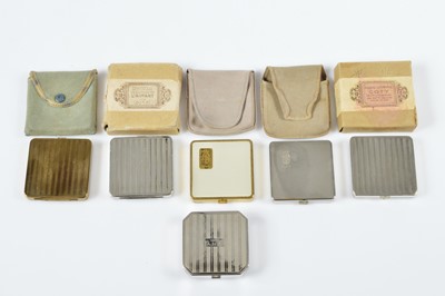 Lot 675 - Four 1920s or 1930s square chrome Coty compacts