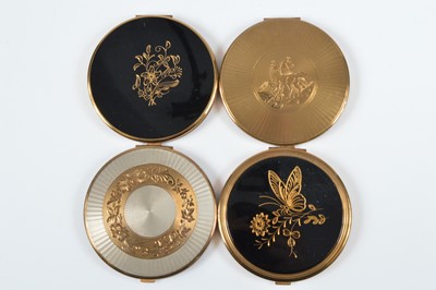 Lot 700 - Four large circular 1950s gilt metal compacts