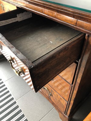 Lot 39 - A Georgian and later walnut chest of drawers