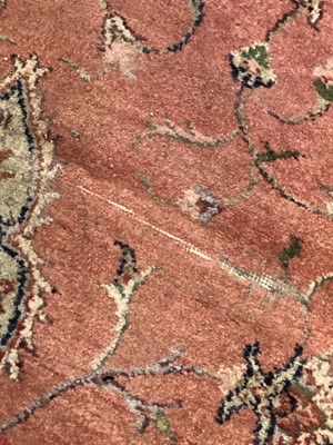 Lot 75 - A large middle eastern woollen rug