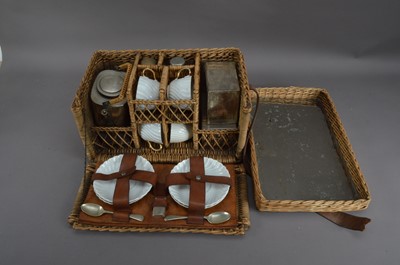 Lot 302 - An early to mid 20th century wicker picnic basket