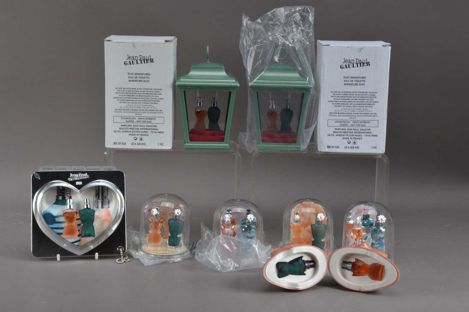 Lot 382 - A collection of Jean Paul Gaultier miniature duo male and women's perfumes