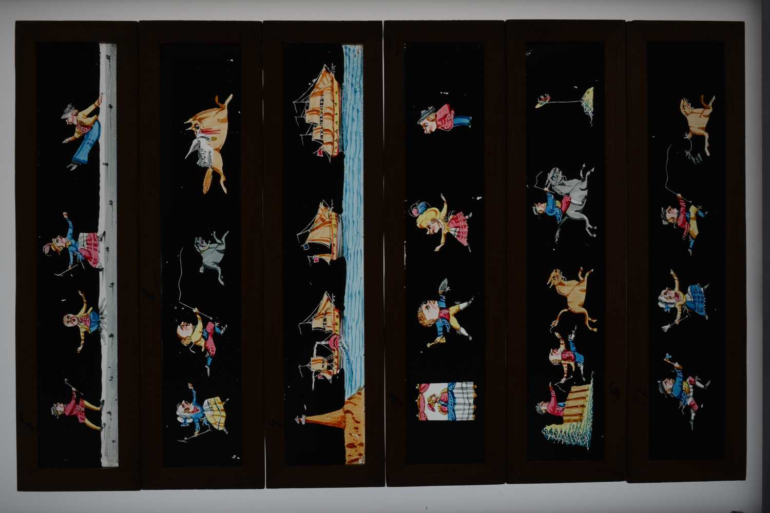 Lot 78 - Mahogany-Mounted Magic Lantern Slides