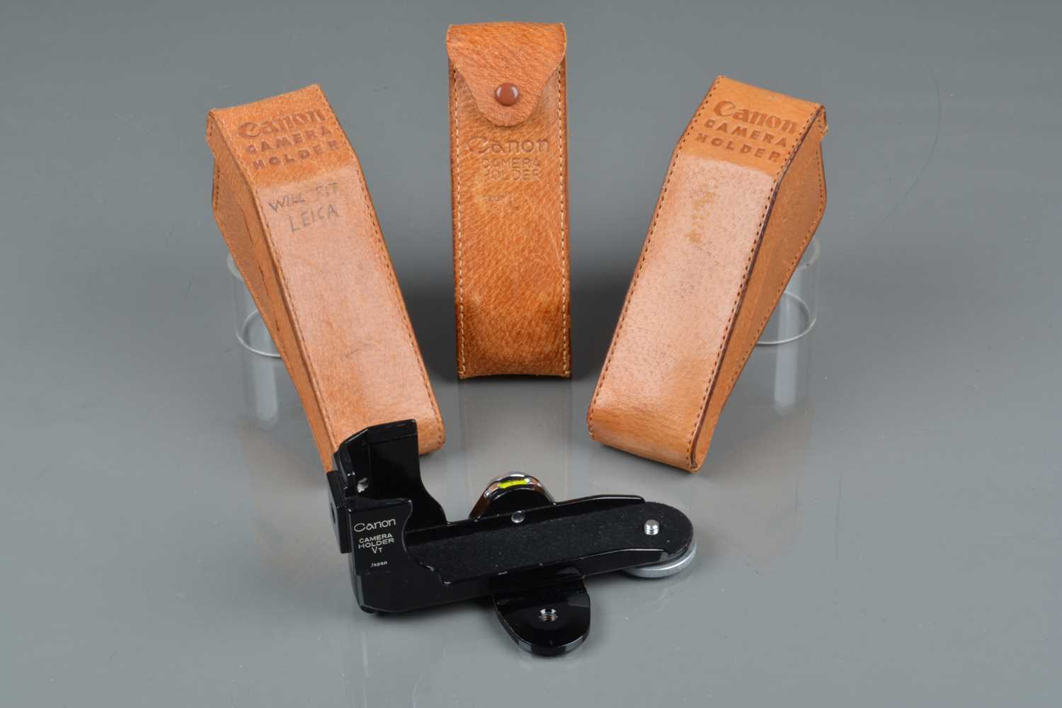Lot 67 - Four Canon Camera Holders