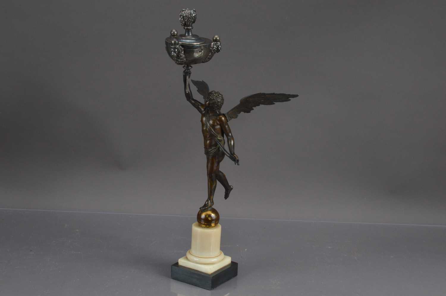 Lot 291 - An unusual antique bronzed sculpture of a neoclassical winged angel