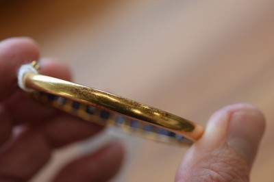 Lot 15 - A nice gold and sapphire bangle