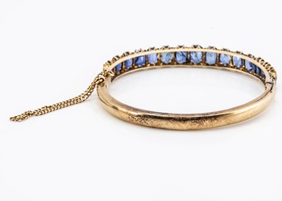 Lot 15 - A nice gold and sapphire bangle