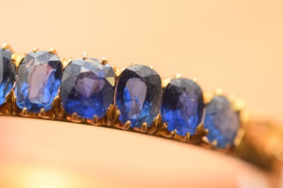 Lot 15 - A nice gold and sapphire bangle