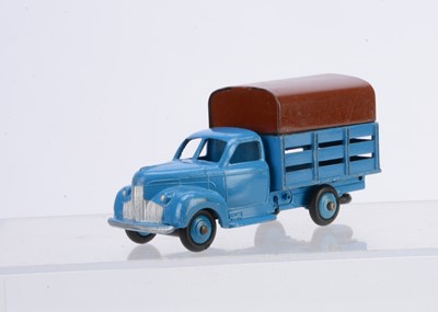 Lot 84 - A French Dinky Toys 25L Studebaker Tapissiere Covered Truck