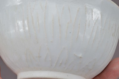 Lot 347 - A Chinese Southern Song Dynasty qingbai incised lotus bowl