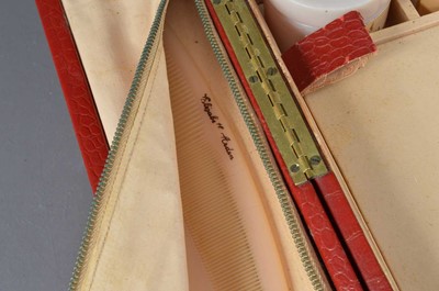 Lot 546 - An original 1950s Elizabeth Arden red leatherette fitted vanity case