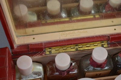 Lot 546 - An original 1950s Elizabeth Arden red leatherette fitted vanity case