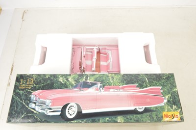 Lot 7 - Maisto 1:12 Scale Pink Cadillac and Jaguar XJ220