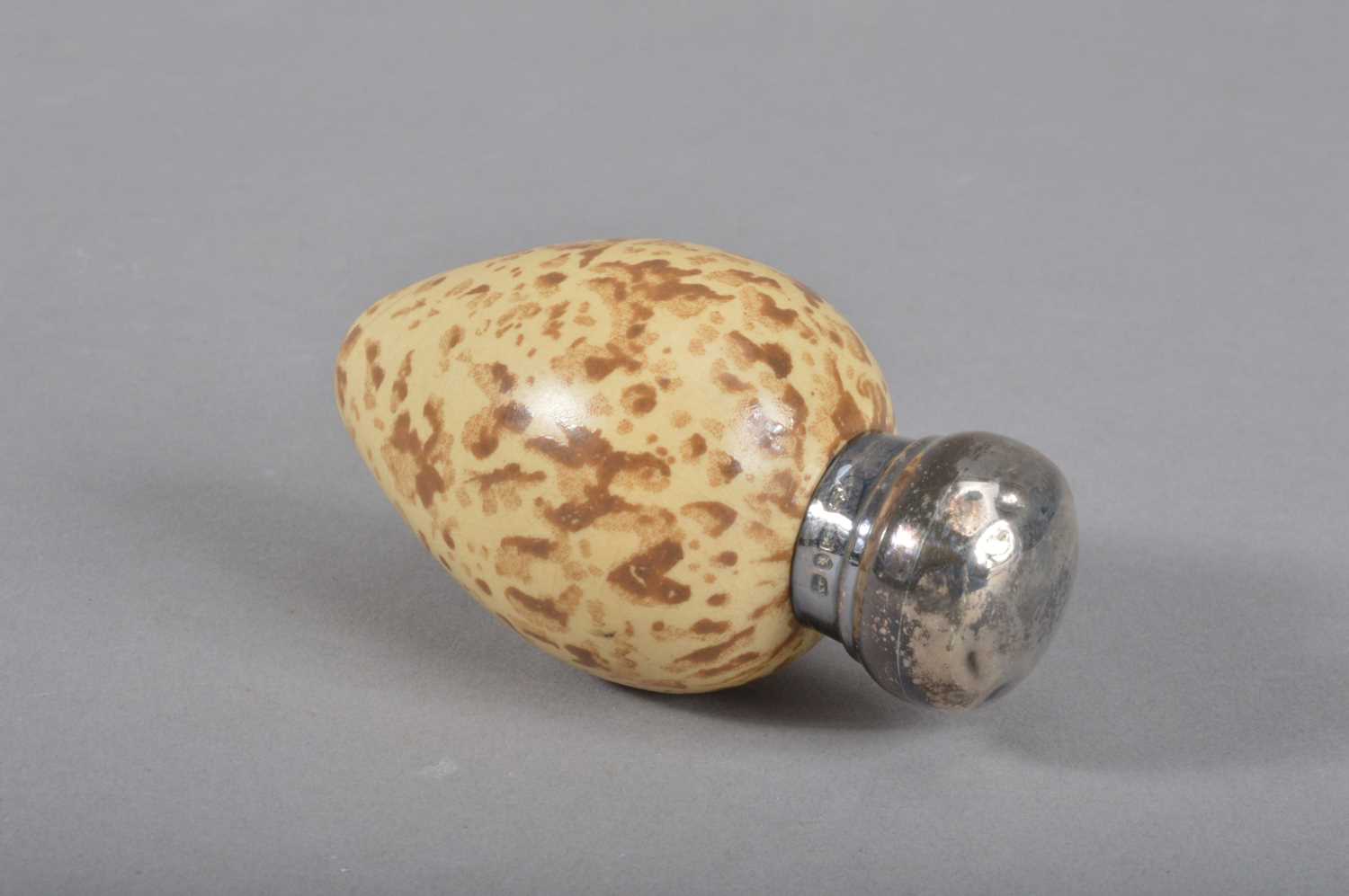 Lot 111 - A Victorian novelty porcelain and silver topped scent bottle