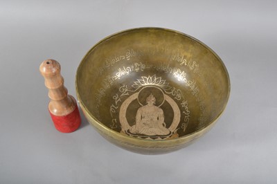 Lot 118 - A 20th century Far Eastern brass and inlaid singing bowl