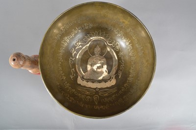 Lot 118 - A 20th century Far Eastern brass and inlaid singing bowl