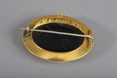 Lot 121 - A 19th Century micro mosaic oval yellow metal brooch