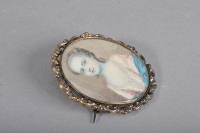 Lot 122 - An 18th Century portrait miniature on ivory within gilt metal oval frame of a young girl