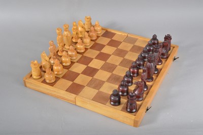 Lot 123 - A 1960's or 1970's wooden chess set and board