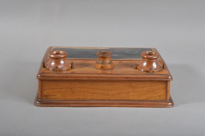 Lot 126 - A 19th century olivewood and stoneware inkwell